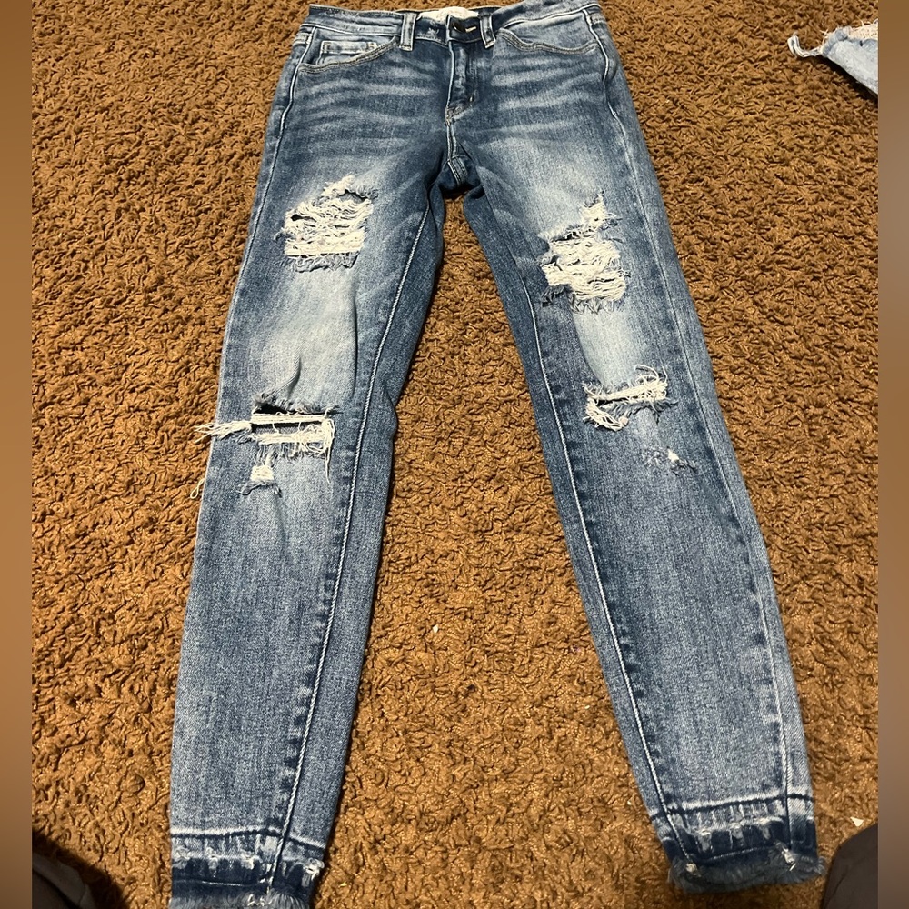 KanCan signature dark wash skinny jeans.
